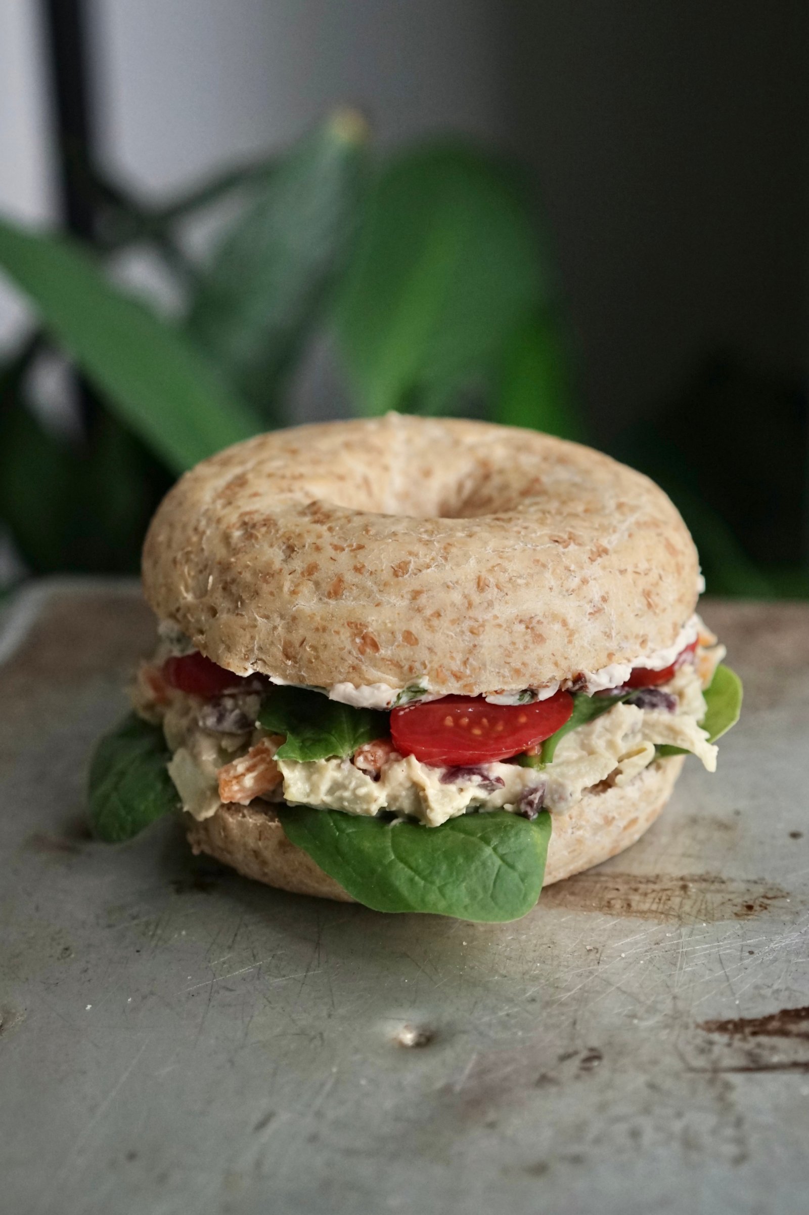 Vegan Mediterranean Bagel Sandwich with Sun-dried Tomato Cream Cheese & Artichoke Hummus | Living Healthy in Seattle